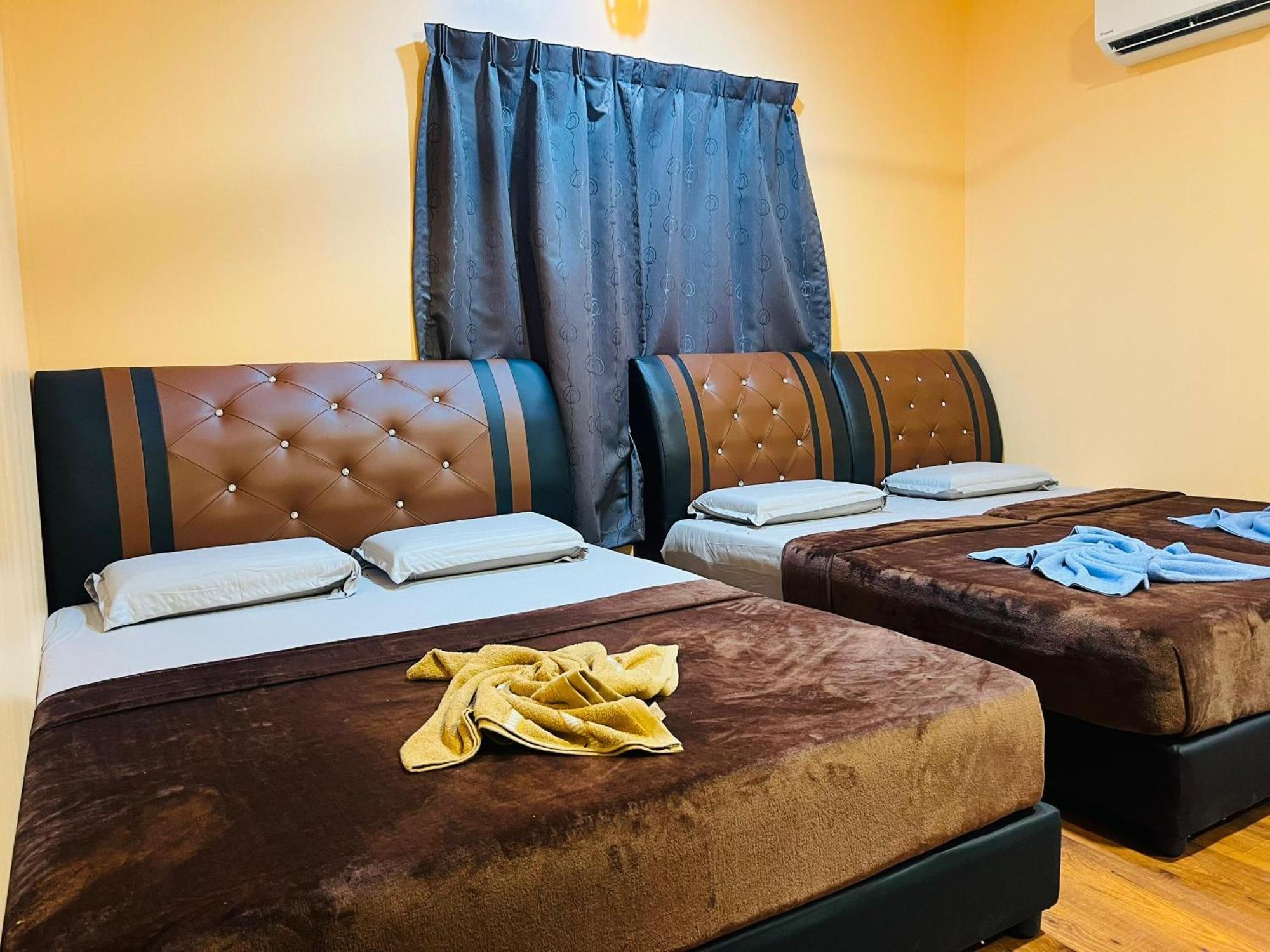 Sukau Backpackers Bed & Breakfast Экстерьер фото